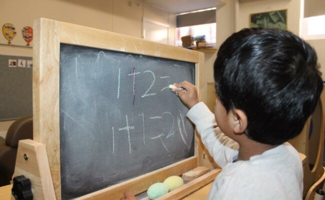 Child doing maths equations