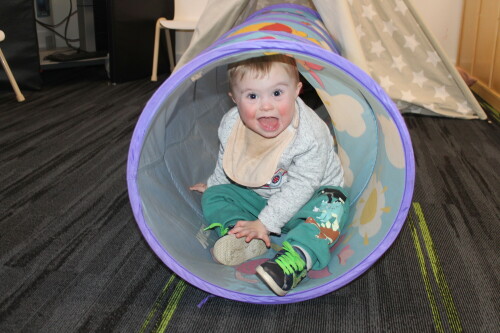 Play to Learn CHild in tunnel